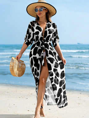 Swim Lushoire Quimono estilo praia com estampa de vaca, mangas murciélago e cinto de amarração na cintura para as férias de verão.
